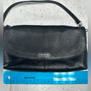 Black Coach clutch with royal green satin lining